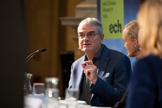 Ulrich Brand engaging in the panel discussion