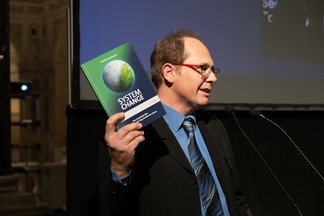Andreas Kroh, Deputy Scientific Director of the NHM Vienna on the podium