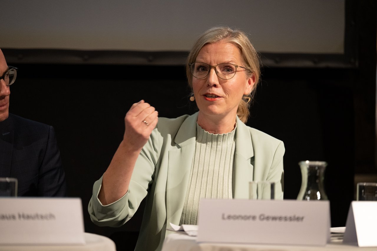 Leonore Gewessler, leader of "Die Grünen" during the panel discussion
