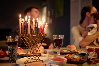 Traditional Hanukkah table with food
